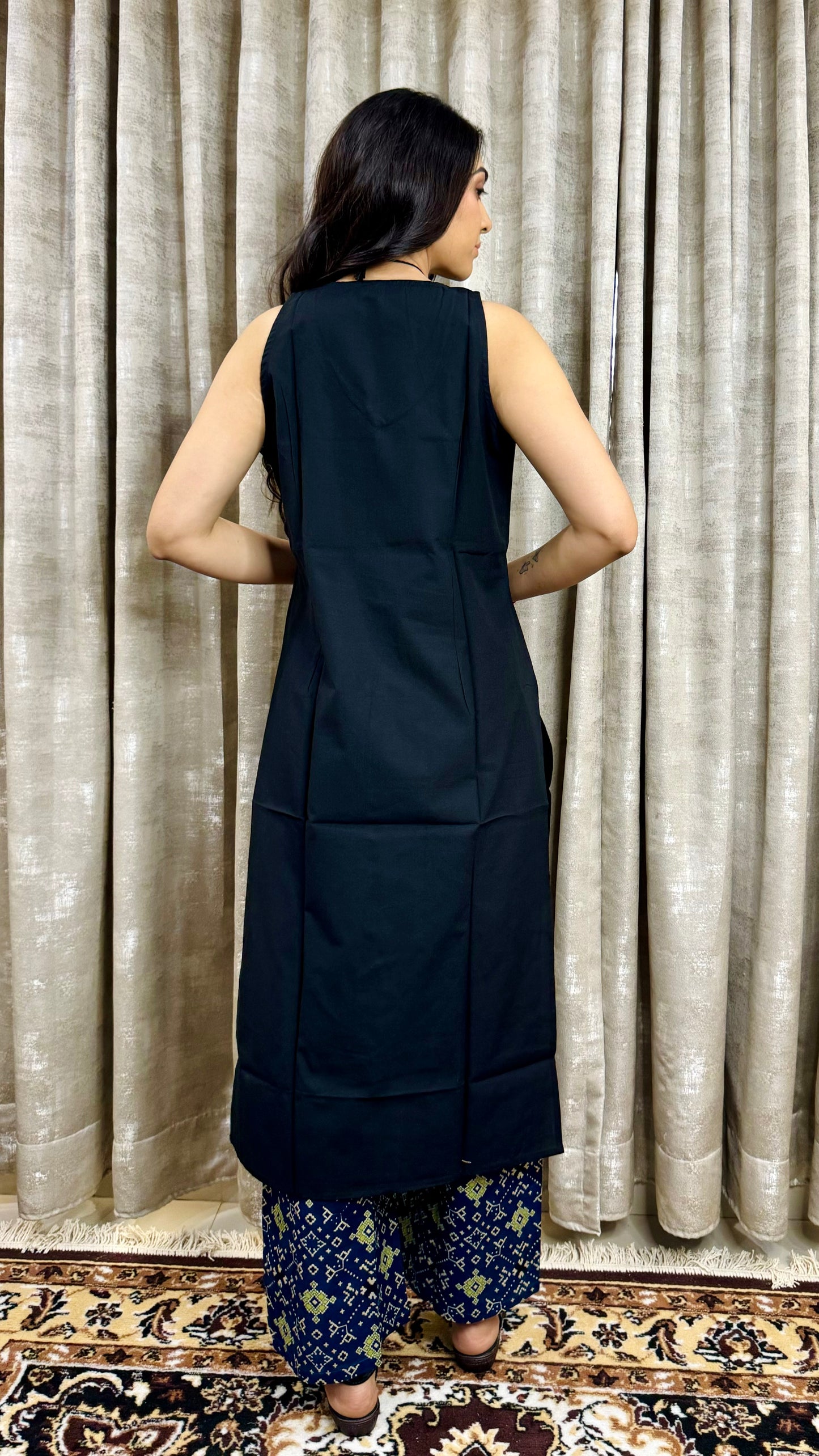 Black sleevless with indigo bottom