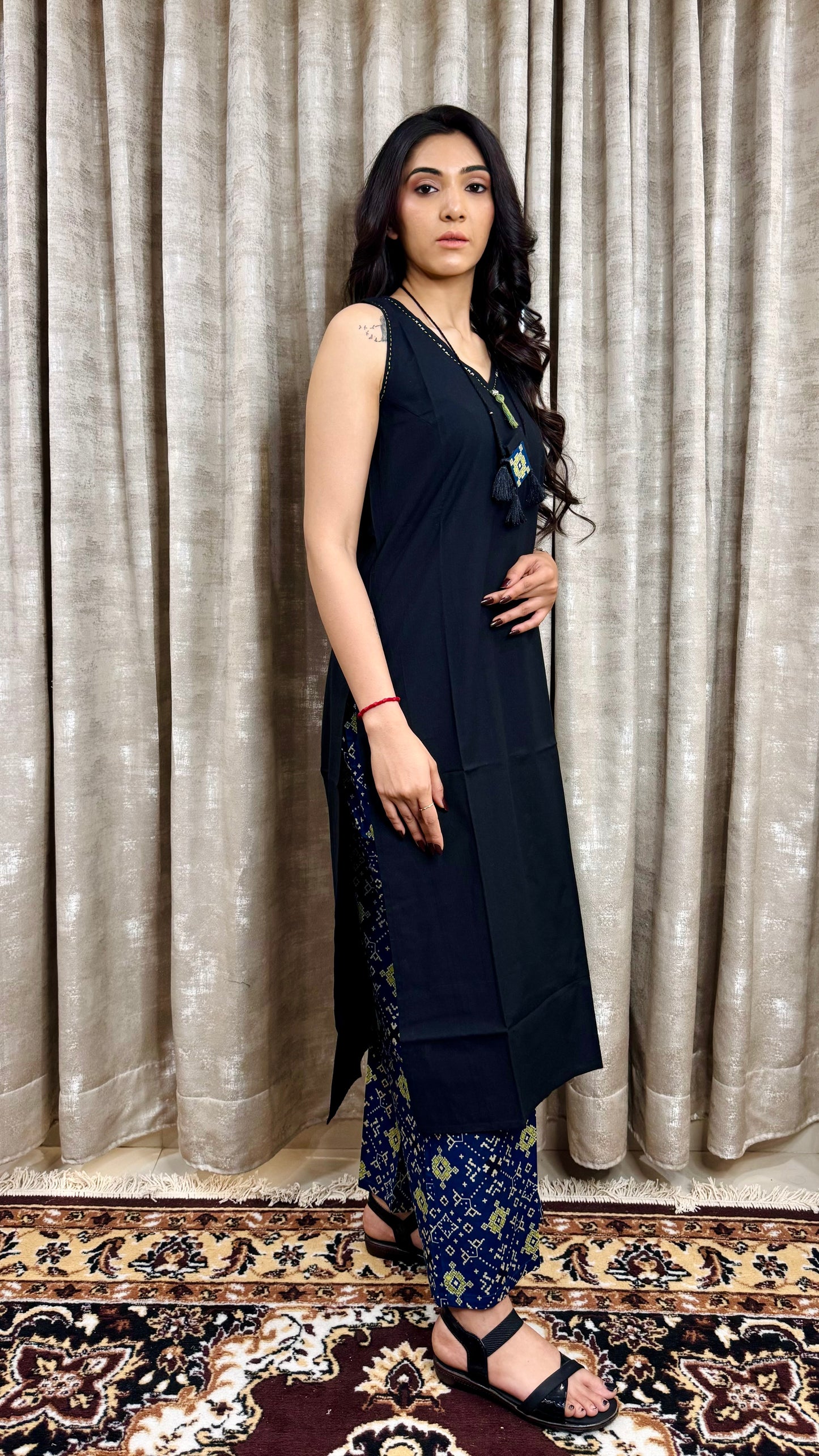 Black sleevless with indigo bottom