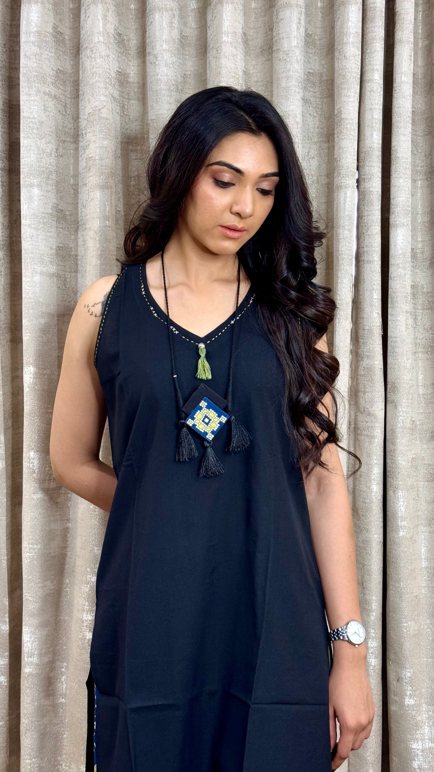 Black sleevless with indigo bottom
