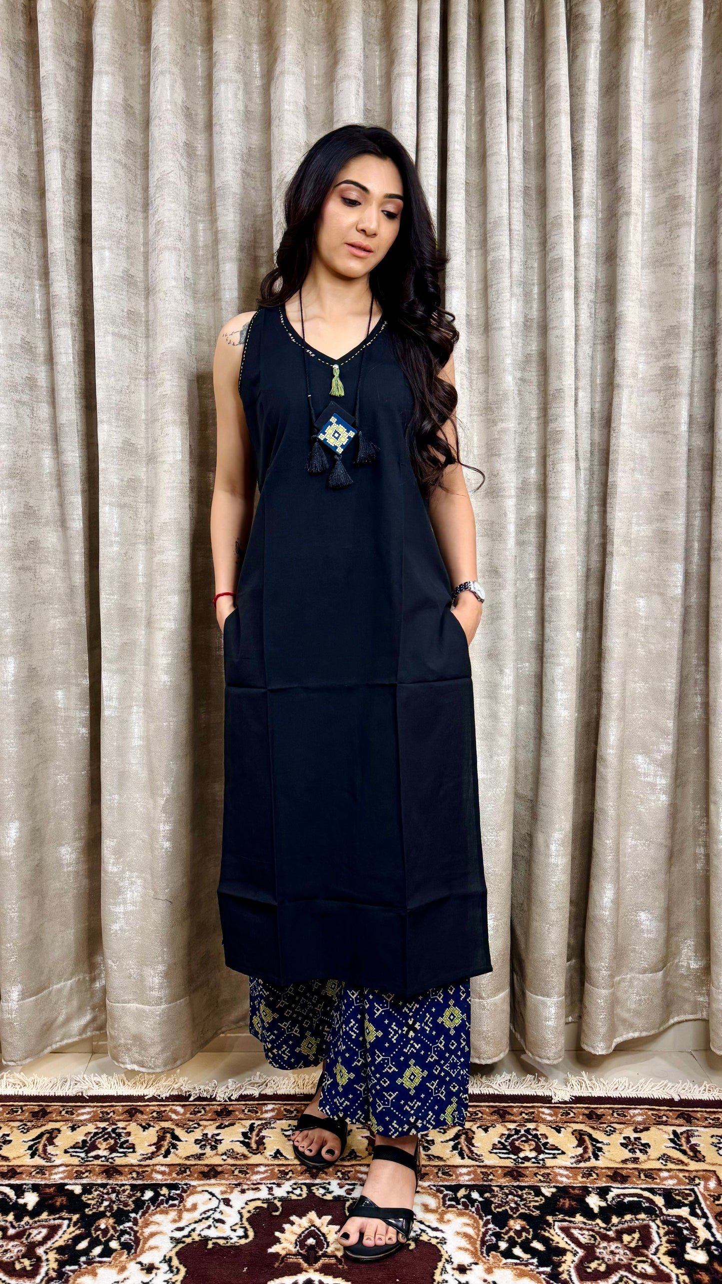 Black sleevless with indigo bottom