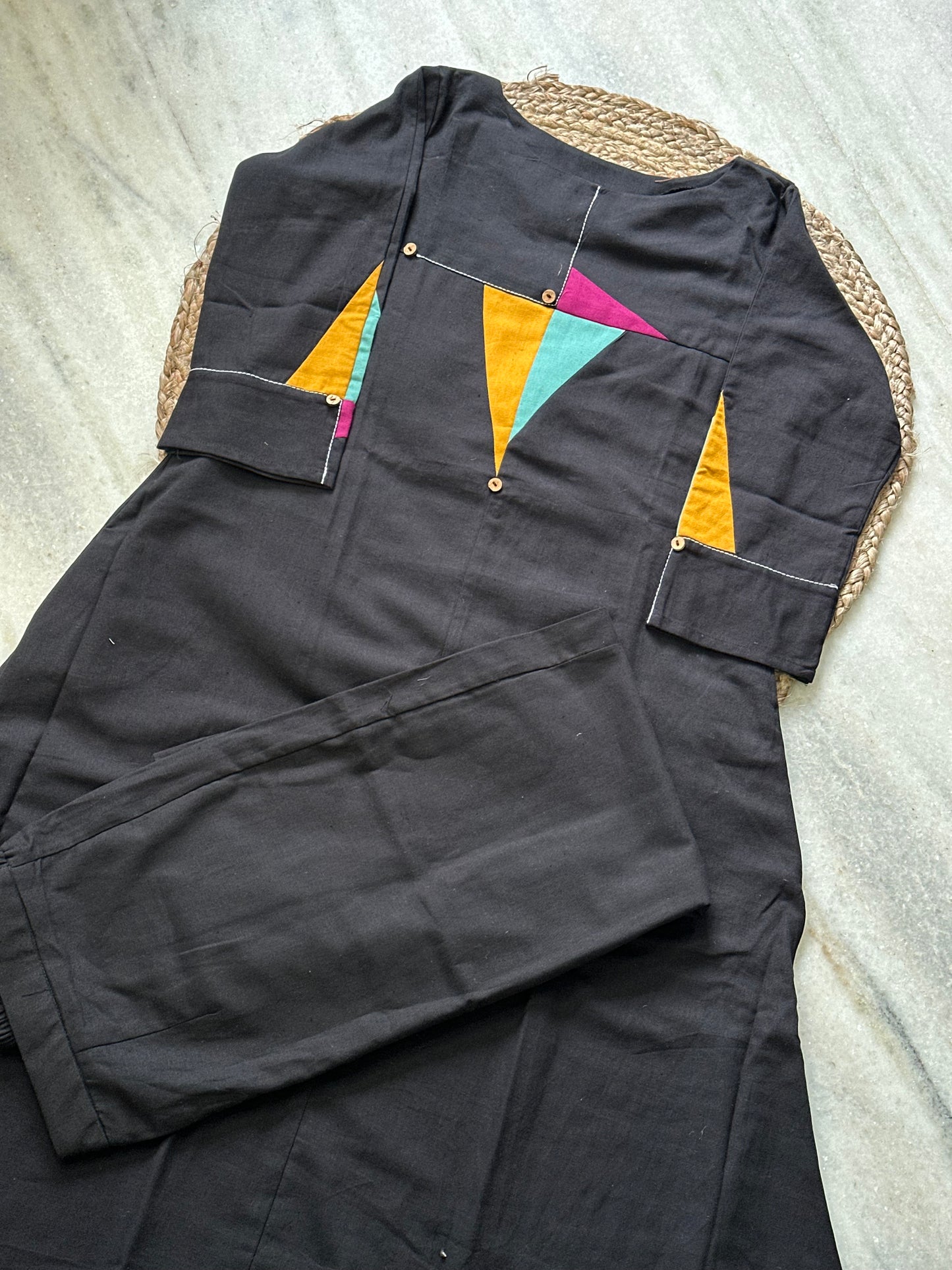 Black patch work pant pair