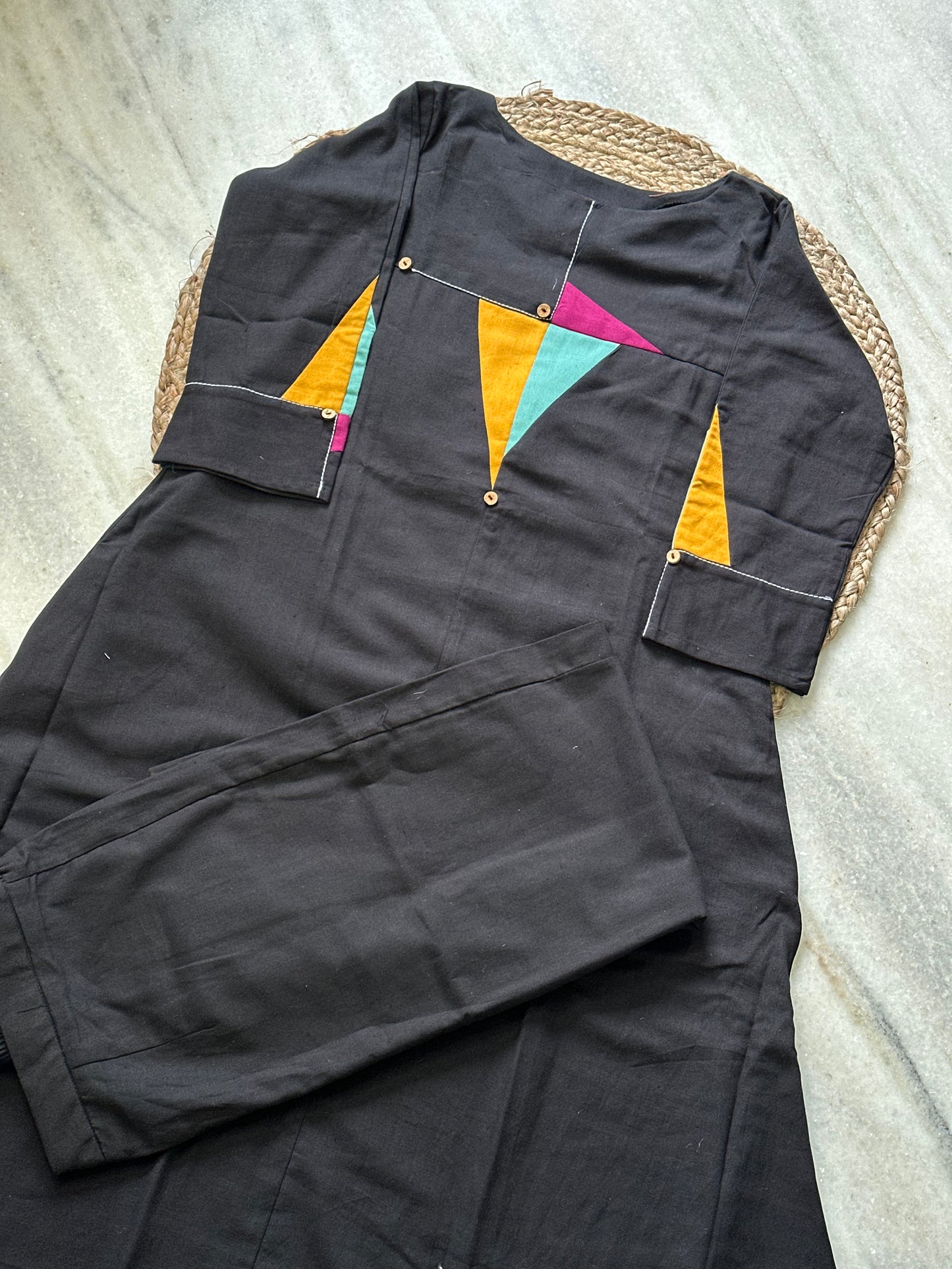 Black patch work pant pair