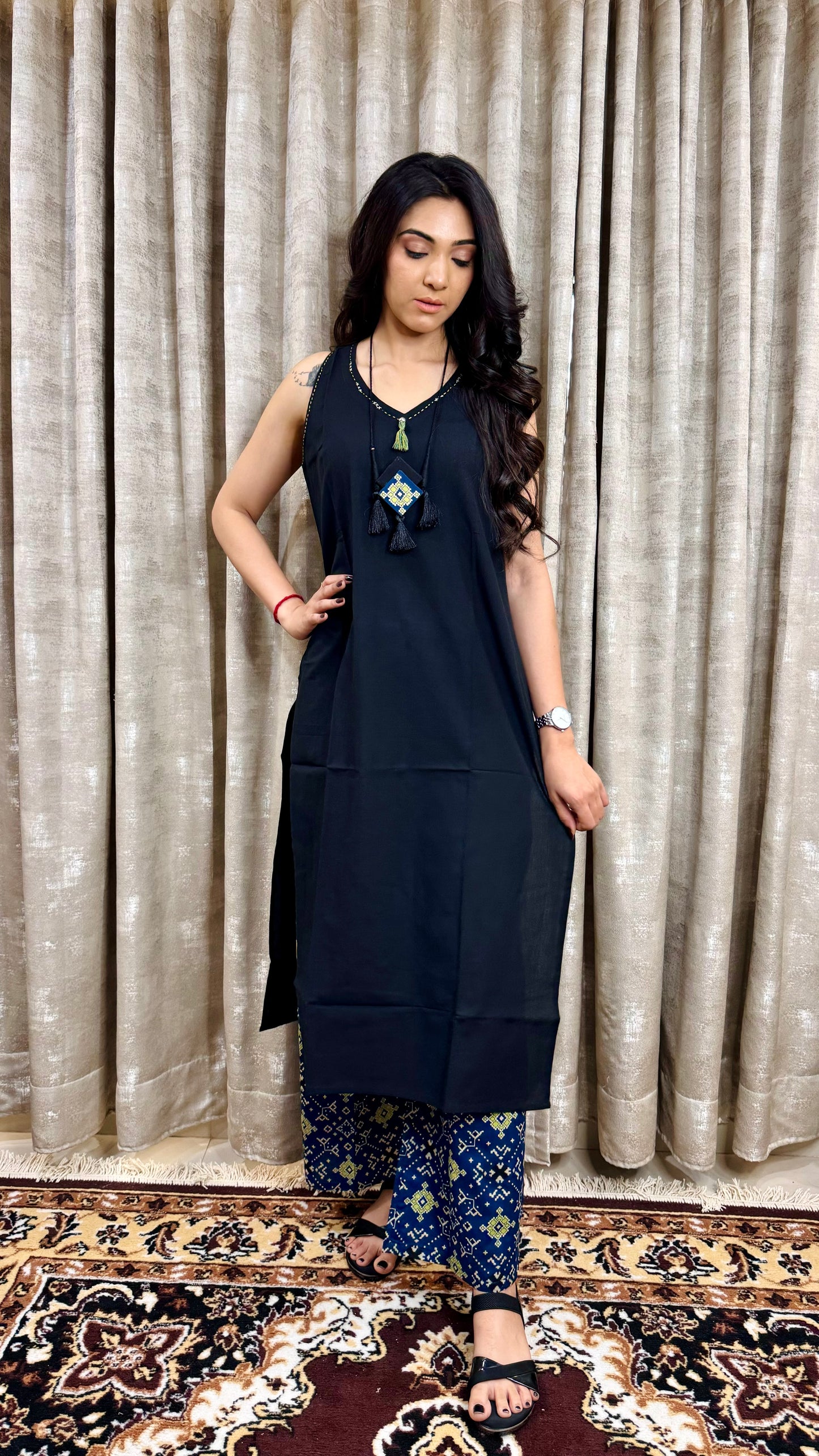 Black sleevless with indigo bottom